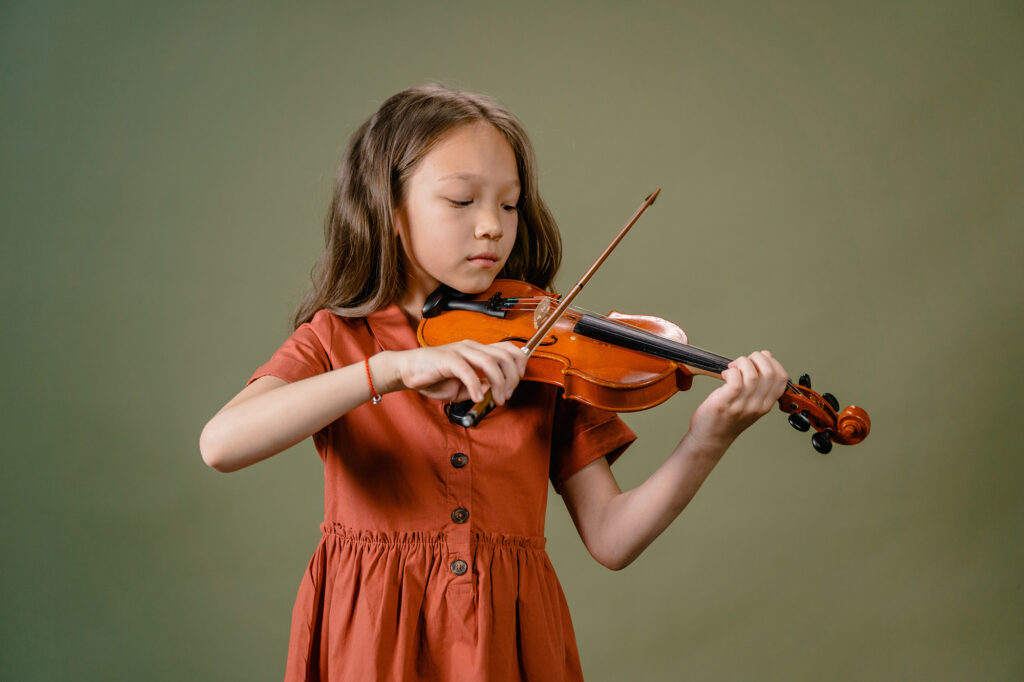 Violin Player image by Mart Production pexels.com